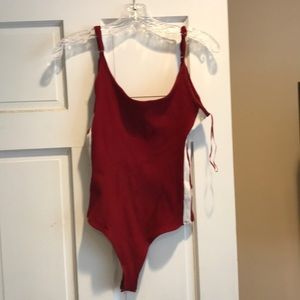 Red and white bodysuit